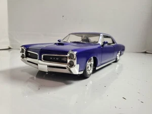 Imperfect - Hot Wheels Classics 66 Pontiac GTO azul escala 1:18 - Imagen 1 de 12