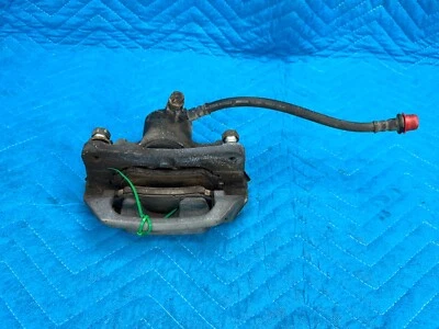 Pinza de freno trasera Toyota Land Cruiser LX470 con pastillas y manguera derecha 89 k 1998-2006 OEM Foto 1 de 4