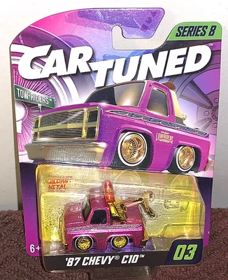 MGA ENTERTAINMENT 2025 1/64 COCHE AFINADO LOWRIDERS '87 CHEVY C10 SERIE 8 #03 ¡NUEVO! Foto 1 de 4