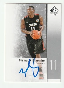 Bismack Biyombo Firmado 2011-12 SP Auténtica Tarjeta de Cubierta Superior Autógrafo Certificado de Autenticidad - Imagen 1 de 1