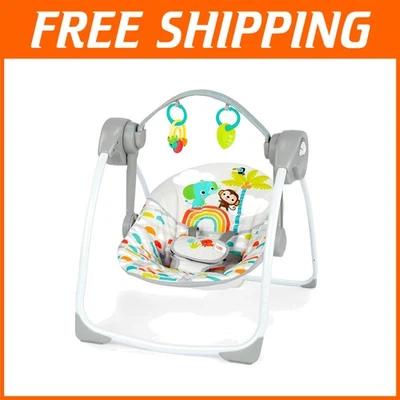 Columpio portátil para bebé Playful Paradise - automático con música y diseño compacto Foto 1 de 4