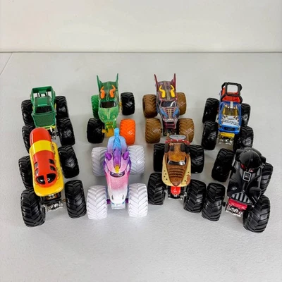 Hot Wheels Monster Trucks Lot Of 8 Monster Jam Darts Vader Sparkle Smash Dragons - Image 1 of 4