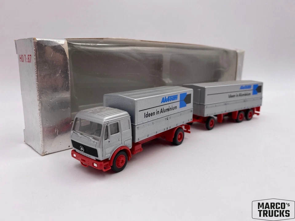 Herpa MB NG Trailer truck 2a/3a silver/red „AluTeam Aluminium“ /H17024 - Image 1 of 1