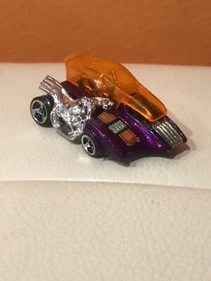 Radios de rueda doblada Hot Wheels Pop Cycle púrpura naranja 1:64 1999 Foto 1 de 4