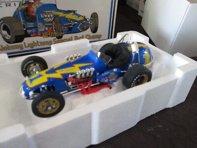 GMP Vintage Series  AL UNSER #1 - Johnny Lightning Special 4-CAM Ford Dirt Champ - Image 1 of 4