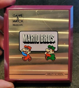 Nintendo Mario Bros. Game and Watch MW-56 Multi Screen 1983 Works Mario Brothers - Picture 1 of 15
