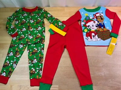 Nuevo Juego de 2 pares de pijamas navideñas Paw Patrol para niños hasChase y Marshall en sombreros de Santa* Foto 1 de 4