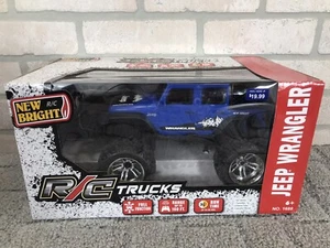 New Bright R/C Trucks Blue Jeep Wrangler No. 1688 Ford Officially Lic Product - Picture 1 of 13
