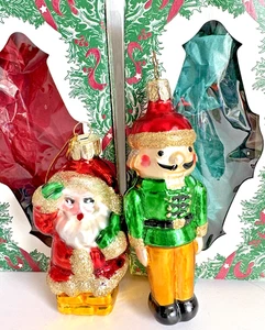 Merck Familys Old World Christmas Ornaments 2 Germany Glass Nutcracker & Santa - Picture 1 of 5