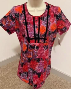 WHITE CROSS WOMENS SIZE XSMALL SCRUB TOP RED ORANGE TREES NEW WITH TAGS - Picture 1 of 1