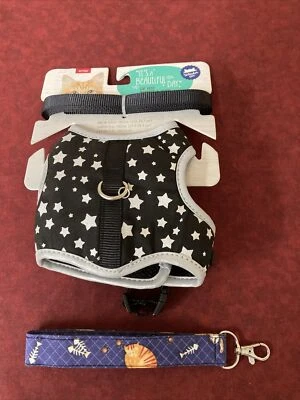 Arnés y correa para gato/chaleco Whisker City, tamaño gatito estrellas negras y plateadas-NUEVO+ GRATIS Foto 1 de 4