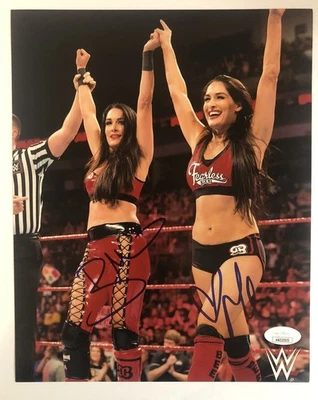 Nikki & Brie The Bella Twins Signed WWE 8X10 Photo JSA COA HOT - Image 1 of 4