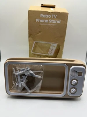 Soporte retro para teléfono TV se adapta a la mayoría de los teléfonos inteligentes soporte de escritorio de plástico marrón Foto 1 de 3