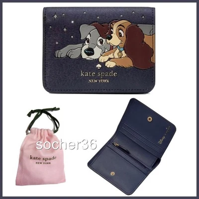 CARTERA PEQUEÑA PLEGABLE KATE SPADE DISNEY X KATE SPADE DAMA Y EL VAGABUNDO NUEVA CON ETIQUETAS $199 Foto 1 de 4