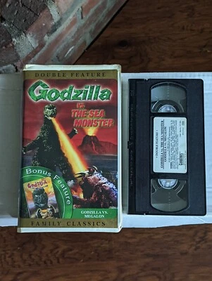 Godzilla vs. The Sea Monster, Godzilla vs. Megalon, VHS Clamshell Double Feature - Image 1 of 2