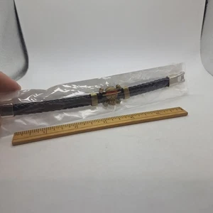 Einteiliges geflochtenes Armband schwarz, silberfarben und goldfarben - Bild 1 von 3