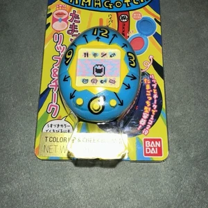 Tamagotchi Lippen- und Wangenbalsam.  0,05 Oz. Pinsel Rose Beige Farbe Shodai Blue Bandai - Bild 1 von 6