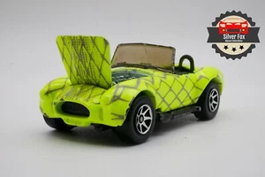 1962-67 SHELBY COBRA VERDE SCALA 1:64 PRESSOFUSO DIORAMA MODELLINO AUTO DA COLLEZIONE - Foto 1 di 10