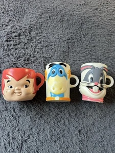Vintage Konvolut drei Tassen 60/70er Feuerstein Dino, Kieselsteine & Käfer Hase - Bild 1 von 11