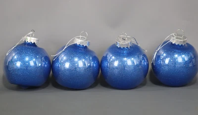 Vickerman 4.75  Clear Ball Christmas Ornament with Blue Glitter Interior  4 pcs - Image 1 of 4
