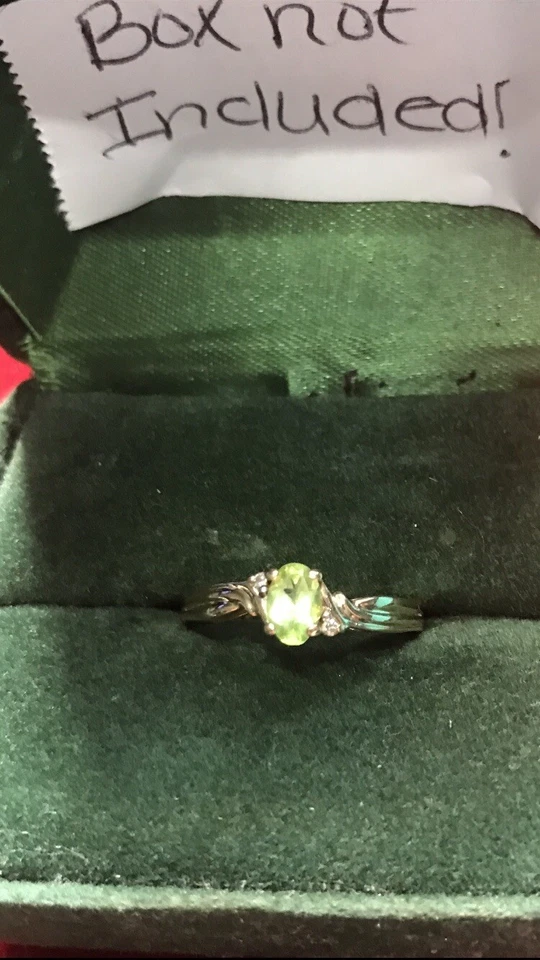 Women Peridot Gemstone 10K with two small ￼Diamonds (used) Size 6 - Image 1 of 4