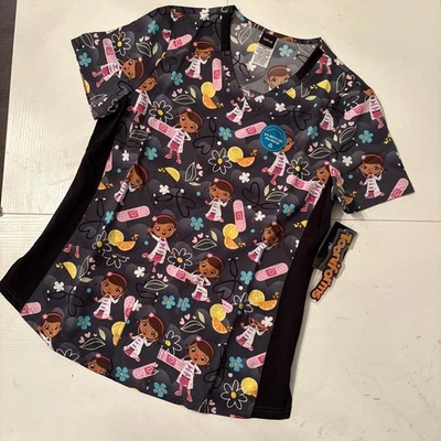 Doc McStuffins Tooniforms V Neck Scrub Top Women’s Size Medium TF780 - Image 1 of 4