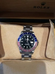 Rolex GMT-Master Men's Black Watch with Blue/Red Bezel Fliplock Clasp - 16700 - Picture 1 of 9