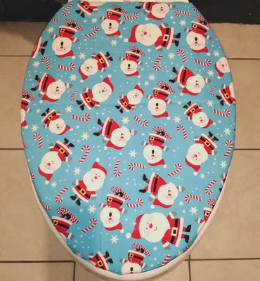 Feliz Navidad Santa Candy Bastes Tela ALARGADA Asiento de Inodoro Tapa Cubierta Foto 1 de 4