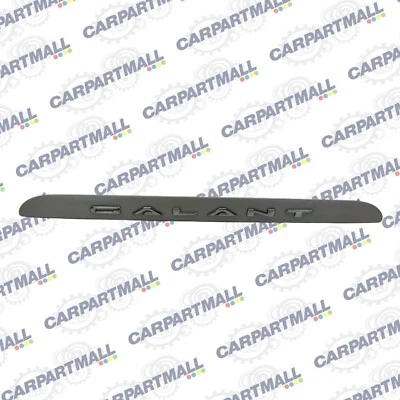 1999 2000 2001 2002 2003 Mitsubishi Galant Sedan Trunk Handle Trim Molding Plate - Image 1 of 4