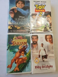 Disney VHS Lot 4 Toy Story2 Ruby Bridge Tarzan Summer Mokey Clamshell Tested - Picture 1 of 10