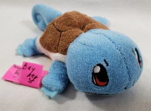 Squirtle Kuta Kutta Tatta tata Soft posa Pokemon trasandato Tomy Nintendo - Foto 1 di 7