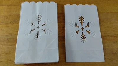 White Snowflake Luminaries. 19 Pieces. To be used with small LED lights. - Image 1 of 3
