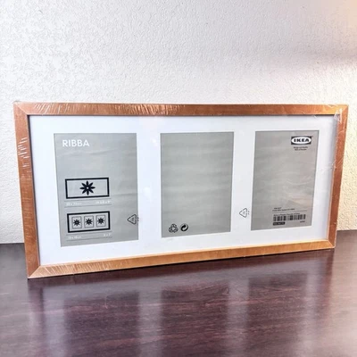 New in packaging IKEA RIBBA multi-opening Teak Wood picture frame 3 5x7 pictures - Image 1 of 4