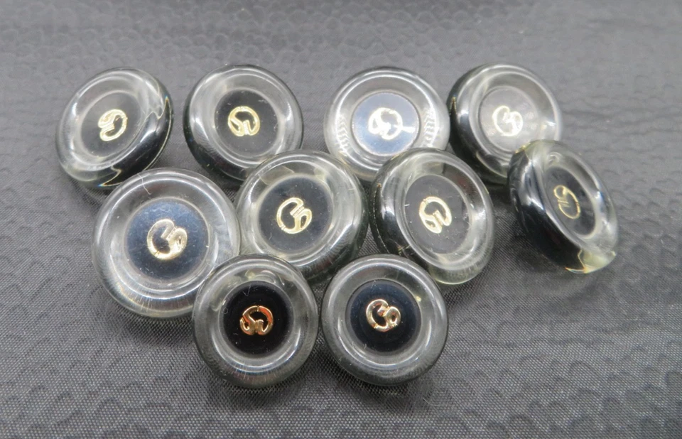 8 large clear/black/gold 7/8" buttons, ST. JOHN, Marie Gray & 2 11/16" ~ shank - Image 1 of 1