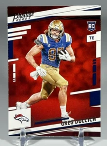Tarjeta de novato Panini Prestige Greg Dulcich RC 2022 #386 Denver Broncos - Imagen 1 de 2