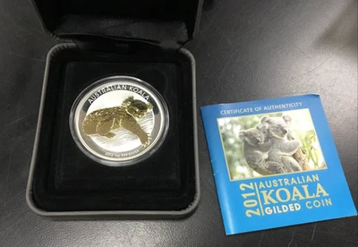 Caja de monedas de plata pura dorada oro koala Australia 2012 1 oz .999 y certificado de autenticidad Foto 1 de 4