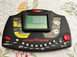 1995 Caesars Palace Tiger 5in1 Hand Held Electronic Game Blackjack Poker Slots - Picture 1 of 6