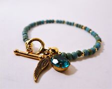 Turquoise Dyed Magnesite Gold Plated Beads and Feather Rhinestone Dangle
