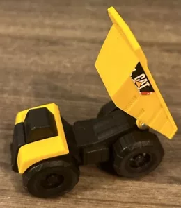 Camión volquete CAT amarillo vehículo de construcción 3,5" de largo plástico usado en excelente estado - Imagen 1 de 4