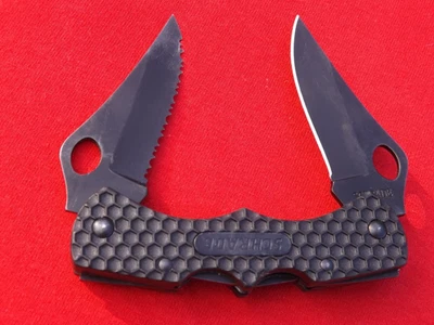 Navaja de bolsillo Schrade SCH005DLB, cuchillo de doble bloqueo con clip de transporte usada Foto 1 de 2