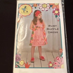 The Cottage Mama Sewing Pattern Ruby Ruffle Dress Uncut ages 6 months to 10 year - Picture 1 of 2