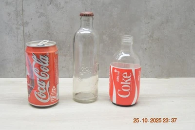 Collectable Coca Cola Drink Bottles & Signed Can - image 1 of 4