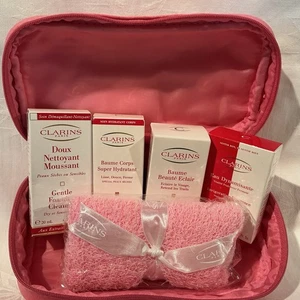 Clarins Minis X 4 and Scrubber in Pink Faux Leather Travel Size Makeup bag - Picture 1 of 11