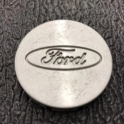 SINGLE CENTER CAP FORD ESCORT 1998-2003 OEM SILVER #F3CC-1A096-AA - Imagem 1 de 4