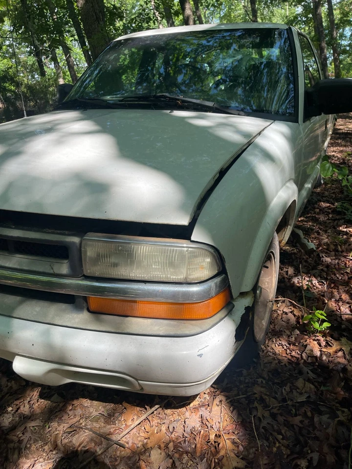Faro izquierdo Chevrolet S-10 2001; fabricante de equipos originales Foto 1 de 1