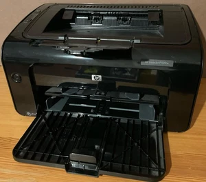 HP LaserJet P1109W W-Lan Wireless s/w Printer Drucker - mit Ersatztoner - Afbeelding 1 van 3