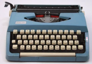 Vintage/Antique Kmart Deluxe 100 typewriter 1960s Blue For Repair AS IS - Picture 1 of 4