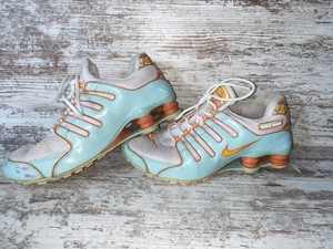 baby blue and pink nike shoes