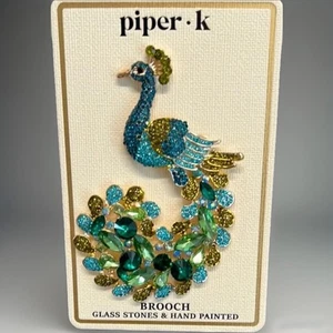 Broche de pavo real Piper K - Imagen 1 de 4