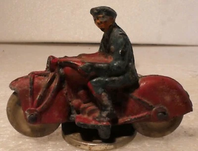 MOTO POLICÍA GOMA CASTAÑO ROJIZO AÑOS 50 ROJO Y AZUL Foto 1 de 4